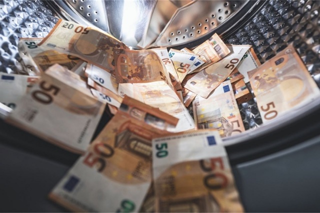 Photo of money inside a washing machine